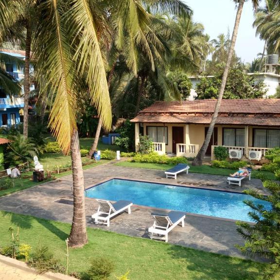 Shaan Coco Palms Resort club mahindra acacia palms resort goa